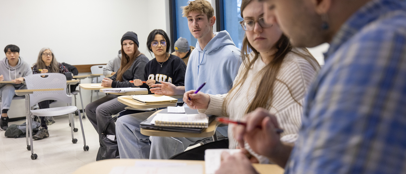 Philosphy students debating in class