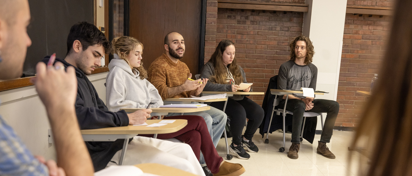 Students in a philosphy class debating