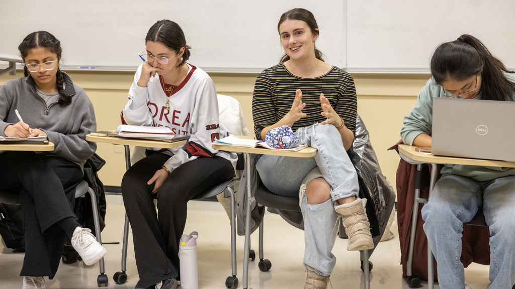 students discussing topics of debate in debate club